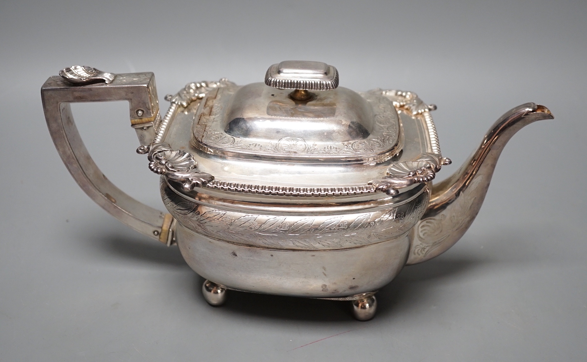 A George III silver teapot, Abstinando King, London, 1808, gross weight 21oz.